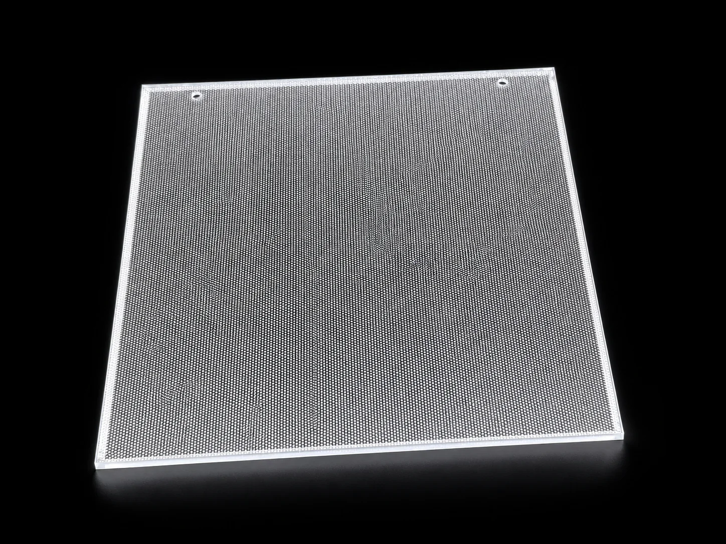 Patterned PMMA light guide panel illuminated from its edge